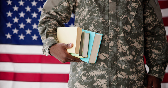 Young Student Soldier In Uniform. Veteran Study