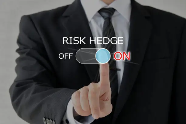 Photo of Business man thinking about risk hedge