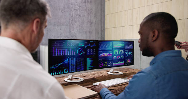 istock Financial Analysis Dashboard Meeting. Pointing At Report 1458141441