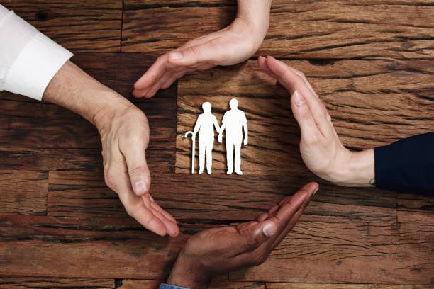 istock Protecting Senior Couple 1458141630