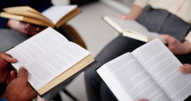 istock Group Of Multiethnic Friends Reading Bible 1458141927
