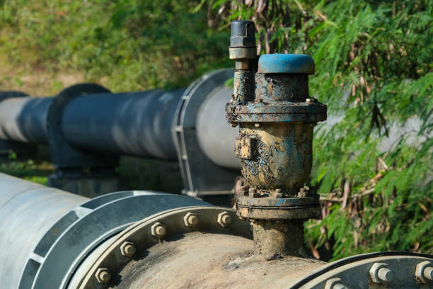istock Pipe is installed along the bridge on the pipe support. Water steel pipes for community utilities. 1458143610