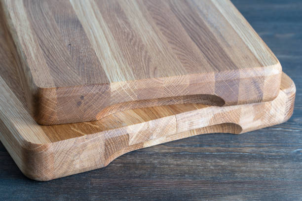 istock Two wooden cutting board on wooden table background 1458144487