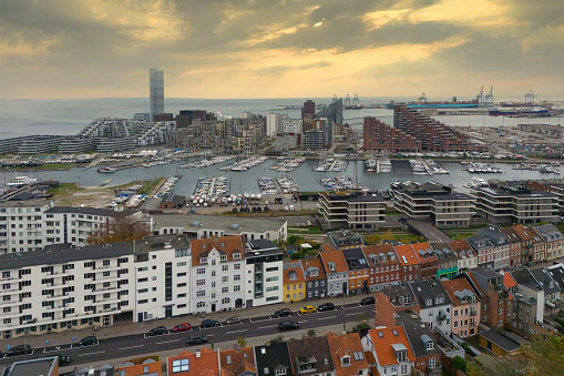 Aerial view of the skyline, waterfront and harbour area at sunrise in Aarhus, Denmark