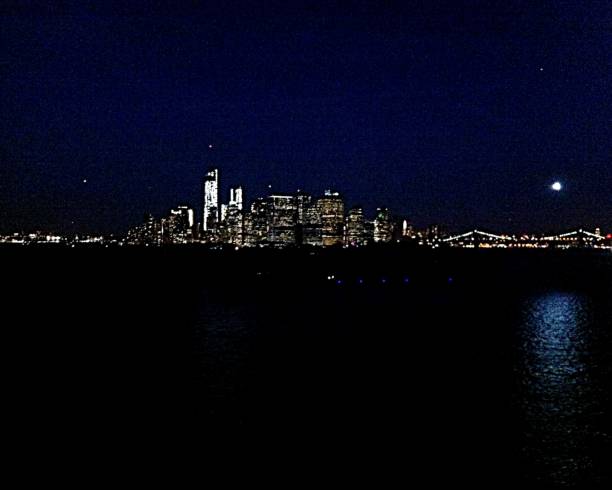 istock Moon over New York City buildings 1458149325