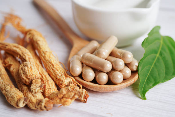 istock Ginseng roots and green leaf, healthy food. 1458151468
