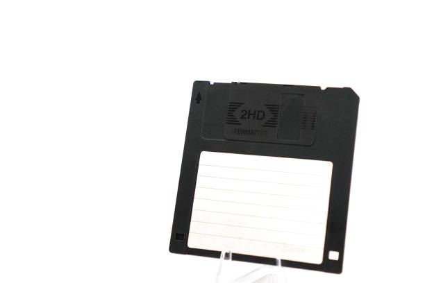 istock The image shows a black retro floppy disk with a capacity of 1.44 megabytes (megabytes) on a white background. 1458153466