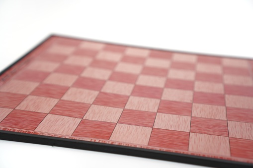The image shows the appearance of a chess and checkers game board on a white background.