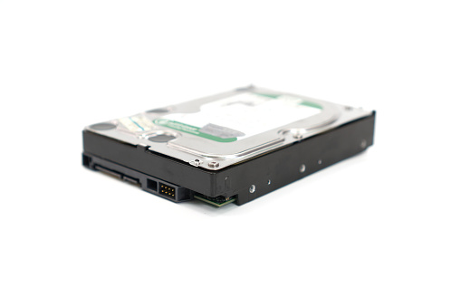The figure shows a 3.5-inch magnetic hard drive used for a desktop or server computer on a white background.