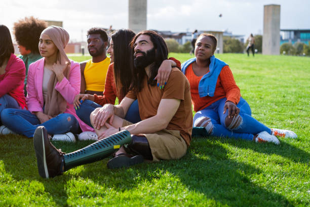 istock Diverse multicultural group together outdoors spending an afternoon together 1458162271