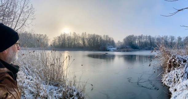 istock Watching the winter lake 1458171112