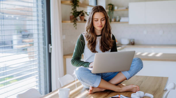 istock Young woman having homeoffice in her apartment. 1458174668