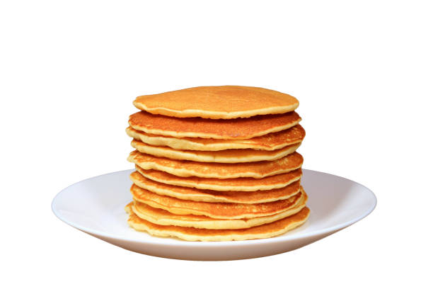 Stack of tasty homemade plain pancakes isolated on white background