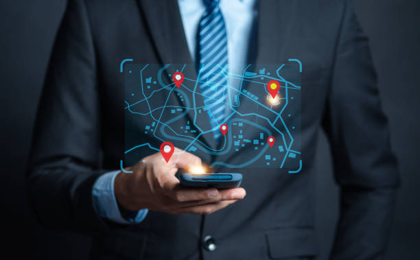 istock Businessman using smartphone searching world map with location point, GPS app, Destination travel maps and find places in the online system, searching by satellite system. 1458178496
