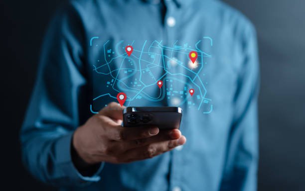 istock Businessman using smartphone searching world map with location point, GPS app, Destination travel maps and find places in the online system, searching by satellite system. 1458178514