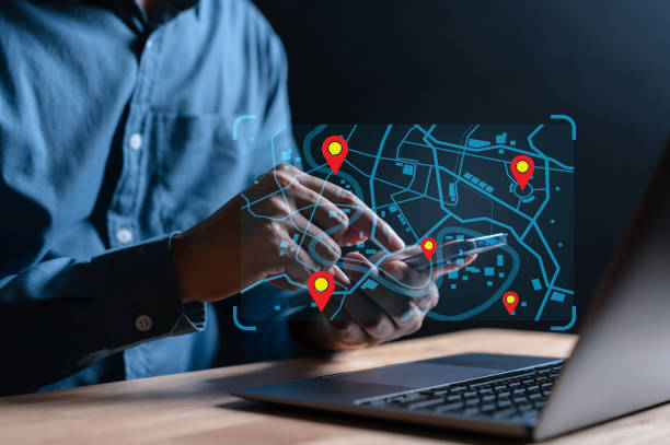 istock Businessman using computer searching world map with location point, GPS app, Destination travel maps and find places in the online system, searching by satellite system. 1458178551