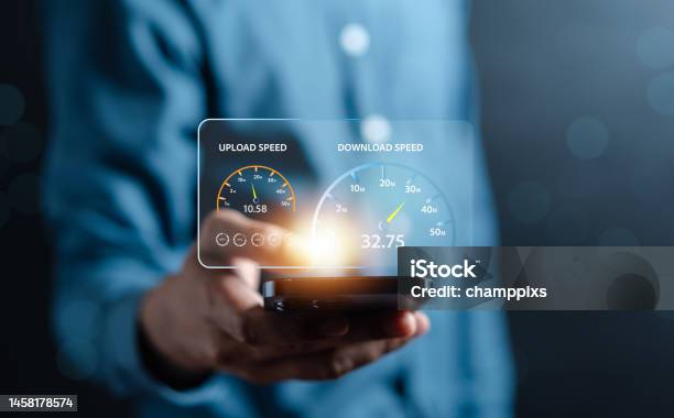 Super Fast Internet Connection Speedtest Bandwidth Network Technology Man Using Internet High Speed By Smartphone And Laptop Computer 5g Quality Speed Optimization Stock Photo - Download Image Now