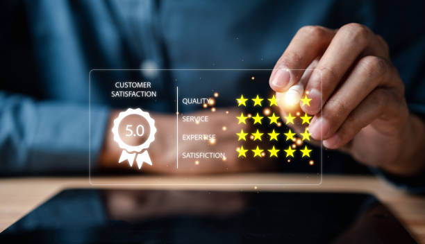 istock Businessman giving five star customer satisfaction feedback review concept.Customer service experience and business satisfaction 1458178622