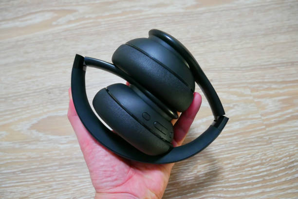 istock Full-size headphones in black. 1458178675