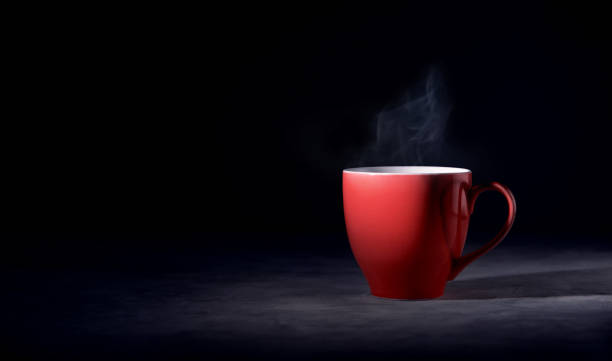 istock Hot Red Coffee Cup on Table with Stream. Dark Tone, Side View with more Copy Space 1458180971