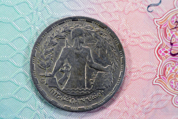 istock Commemorative issue First Anniversary  October 6 1973 Ramadan War Egyptian Israeli war, 5 Egyptian piasters for Victory of Egypt features Egyptian soldier on obverse, date and value on reverse 1458184988