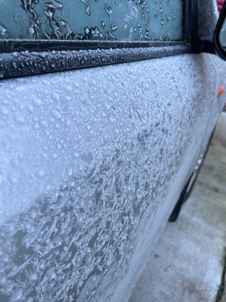 istock Frosty morning ice on car 1458185165