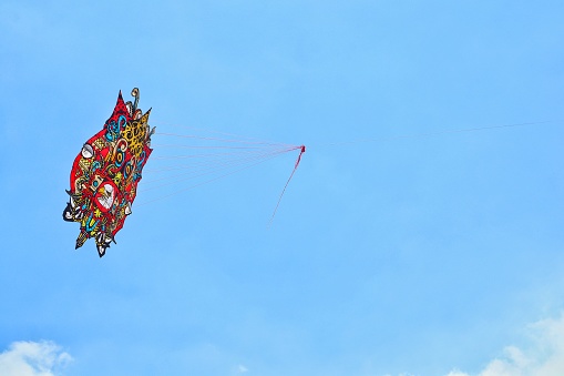 Surabaya, Indonesia - September 26, 2022 : kite flying in the sky in surabaya kite festival
