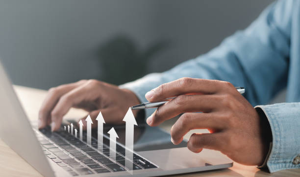 istock Businessman working with modern laptop computer. Planning and analyzing business and financial growth. Business incremental growth concept. 1458190921