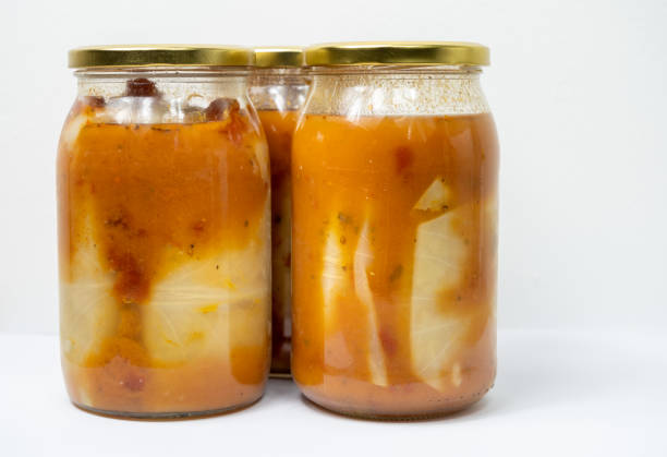 istock Stuffed cabbage in a jar with tomato sauce 1458192341