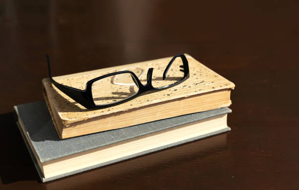 istock a broken eyeglass frame lies on a street ribbed tile 1458195852
