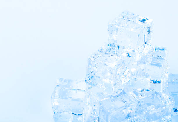 istock The group of ice cubes on white background. 1458204859