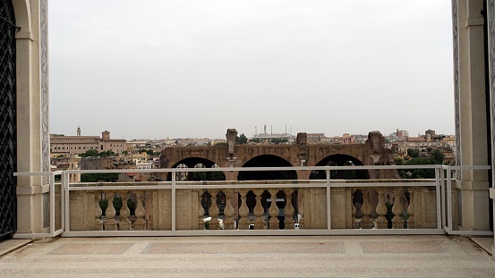 Rome, Italy, June 23 2021. A glimpse of the city from the balcony of an ancient villa during a summer day.