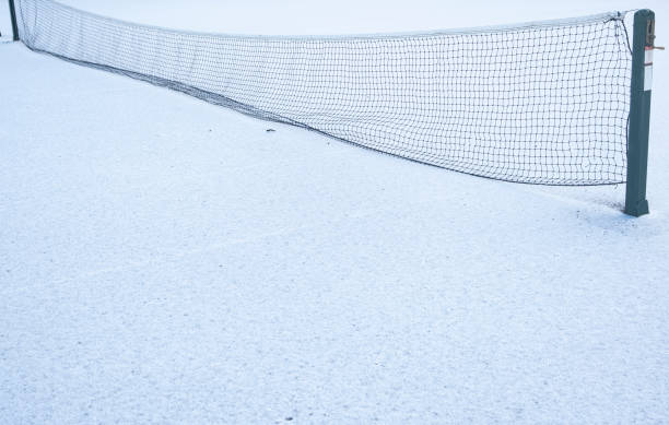 istock Snow on tennis court 1458214058