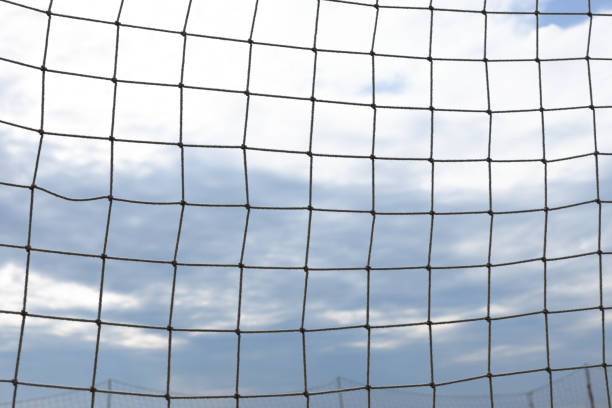 istock Volleyball net with blue sky for background design 1458218385