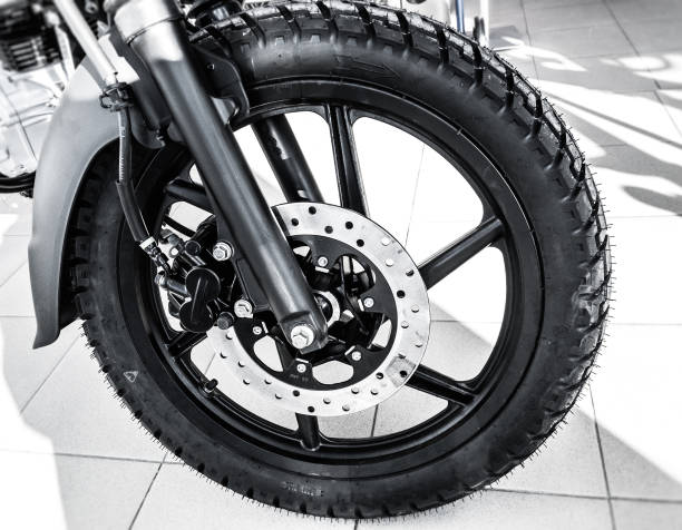 istock front wheel of brand new motorcycle 1458219328