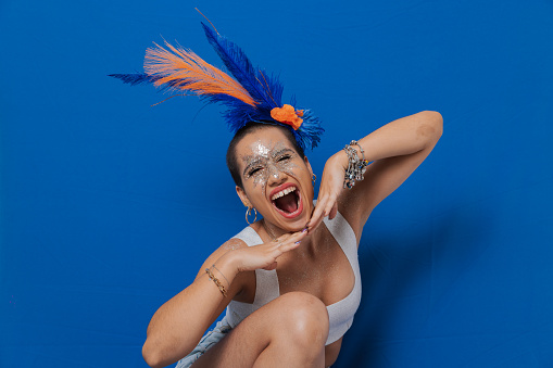 Brazilian carnival, woman dancing, smiling and happy