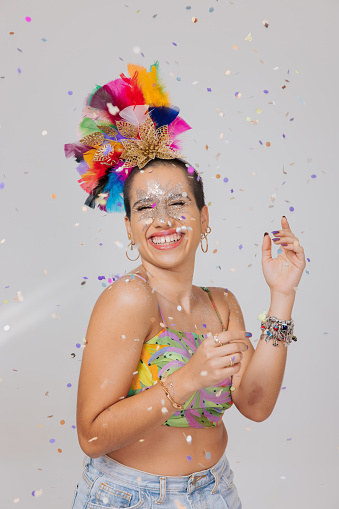 Brazilian carnival, woman dancing, smiling and happy
