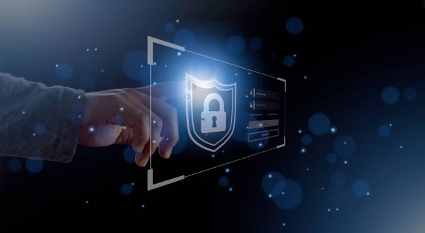 istock cyber security internet and networking concept. Businessman hand working with VR screen padlock icon on computer background 1458224884