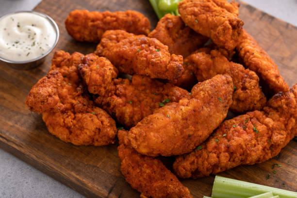 istock Buffalo chicken fingers served with celery and ranch 1458229513