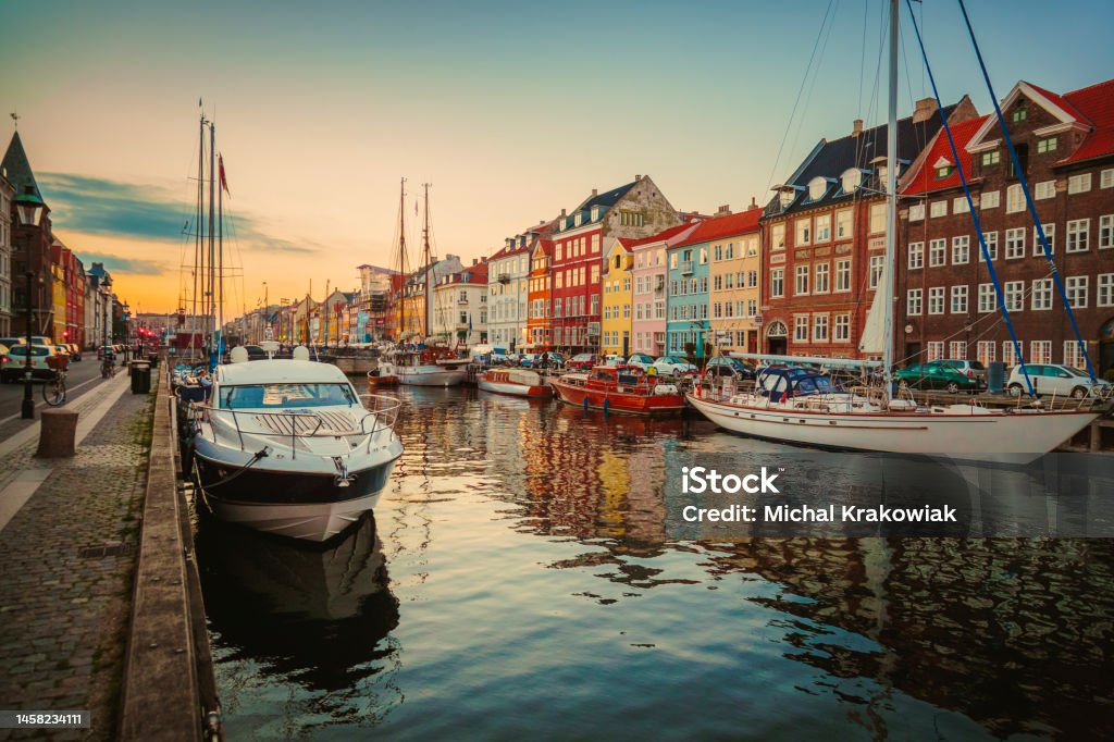 Famous Nyhavn canal in Copenhagen, Denmark Historical harbor and waterfront with colorful townhouses in Copenhagen, Denmark. Photo taken during iStockalypse event with Canon 5D Mark III Copenhagen Stock Photo