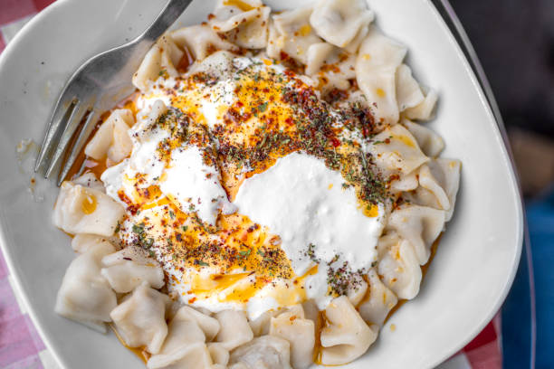 istock Turkish Manti Manlama with yogurt and fried butter sauce 1458239154