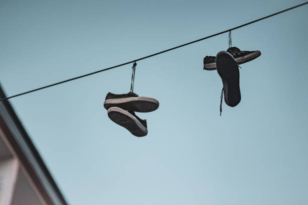 istock Sneakers Tied on Line 1458241914