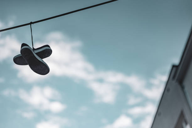 istock Sneakers Tied on Line 1458241957