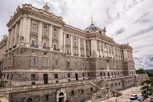 Madrid, Spain - June 20, 2022: Facade of the royal palace in Madrid from the side of the Sabatini Royal Gardens