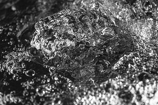 Black and white close-up shot of hot tub water