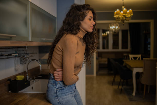 istock Young woman suffering from pain 1458246113