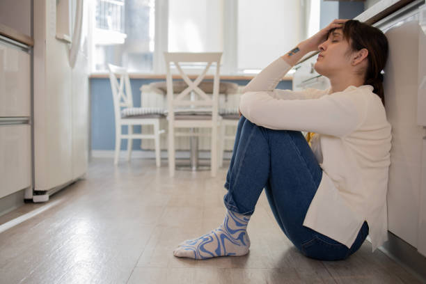 istock Young woman in pain 1458246124