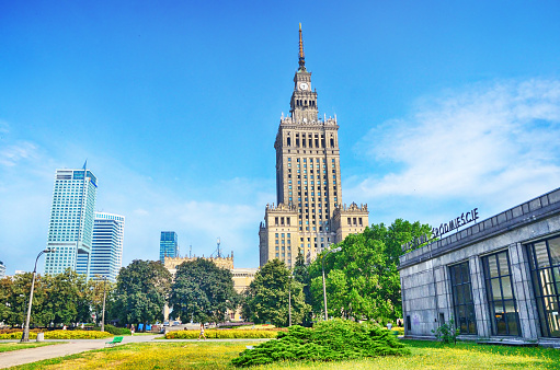 Palace of Culture and Science in Warsaw, Poland. Construction started in 1952 and lasted until 1955 as gift from the Soviet Union to the people of Poland. Composite photo