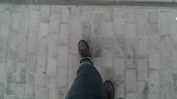 Woman Legs In Gray Pants And Brown Winter Boots Walk Along The Sidewalk Top  View Video 9 Seconds Stock Video - Download Video Clip Now - iStock