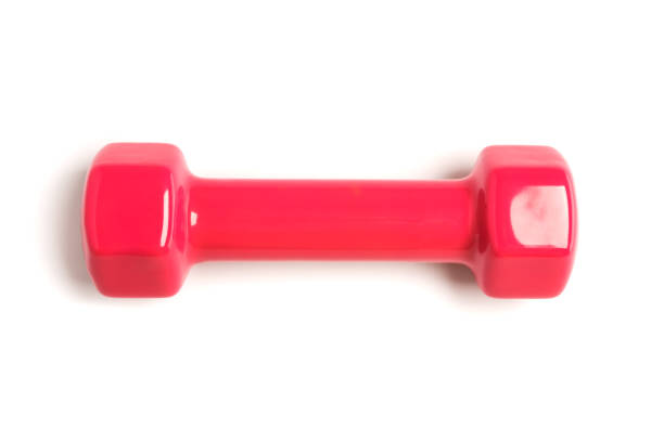 istock Pink or red dumbbells on a white background. 1458249781